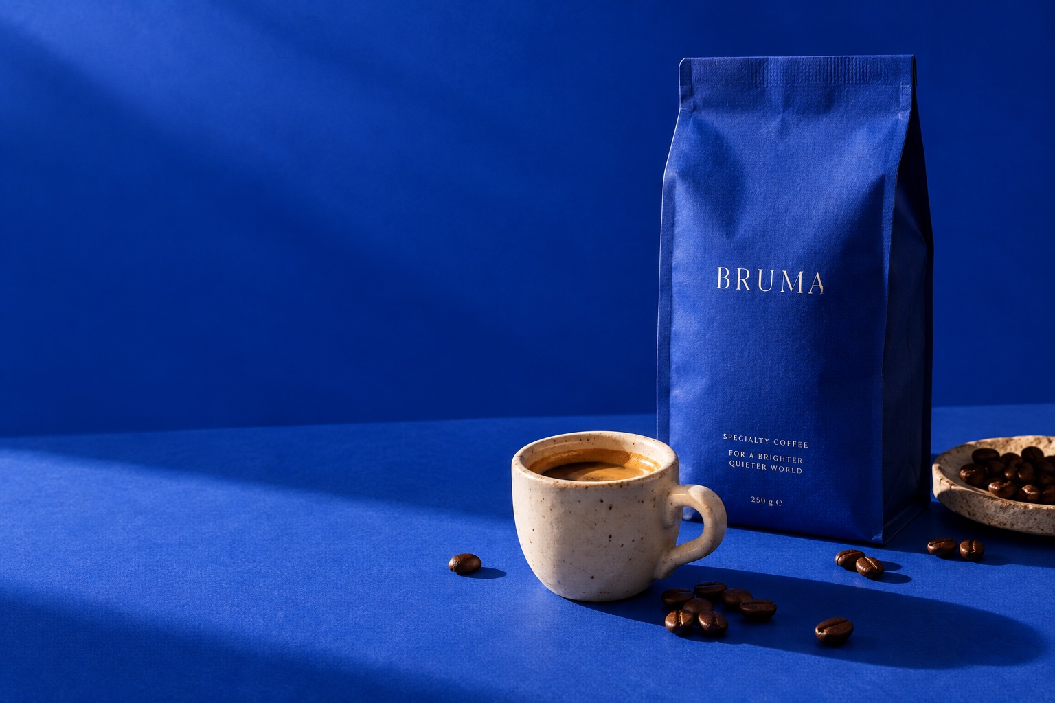Blue Bruma coffee bag and a ceramic cup, a product photography concept
